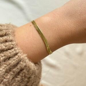 Narukvica zmija II - narukvica od nehrđajućeg čelika s pozlatom, savitljivog oblika i elegantnog dizajna. Idealan izbor za poklon ili svakodnevno nošenje.